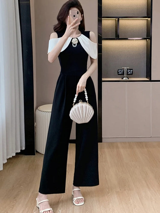 Cold Shoulder Jumpsuit with White Sleeves – Elegant & Stylish Women's Fashion Outfit